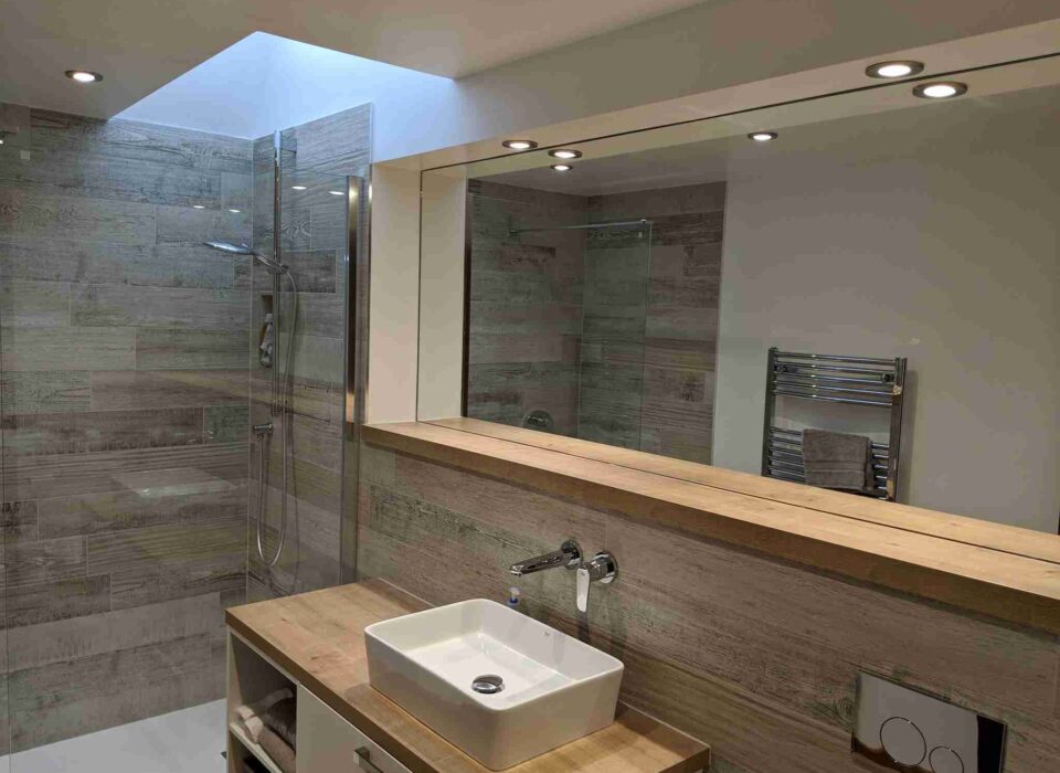 Made to measure bathroom mirror supplied and fitted by Clearly Glass Ltd, leading glass suppliers in Gloucestershire.